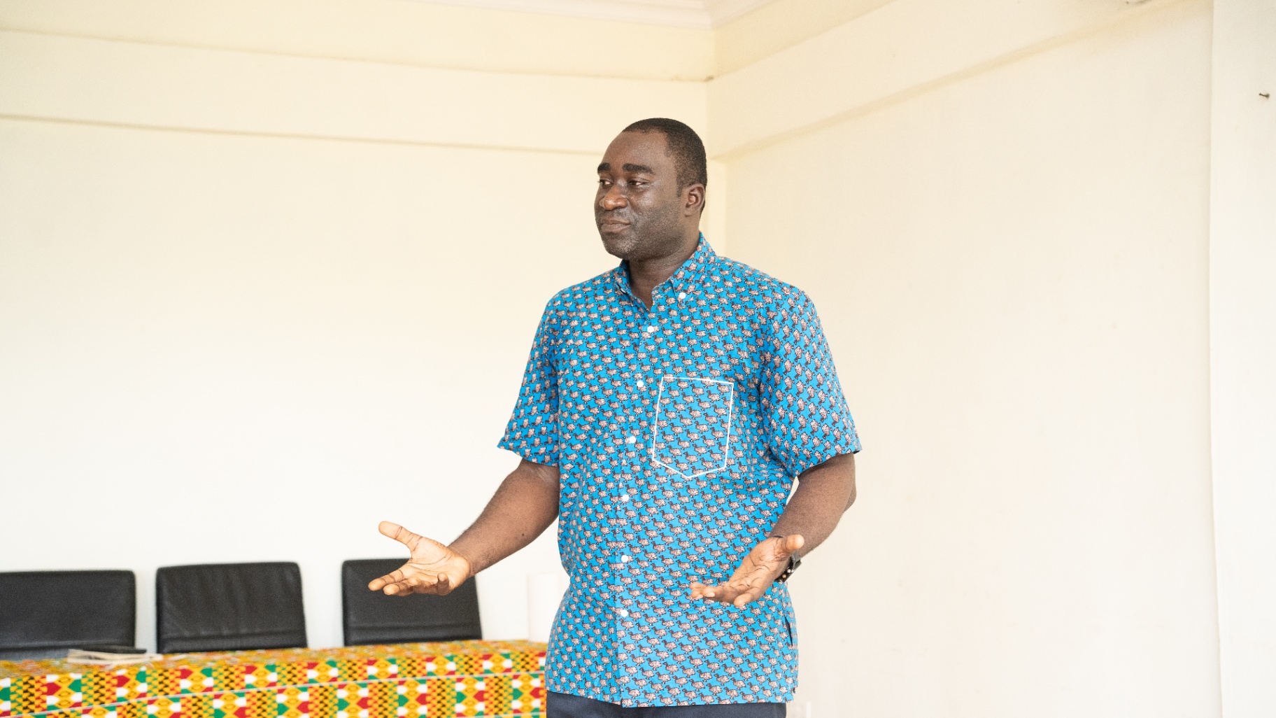 Ghana Health Service partner speaking to attendees