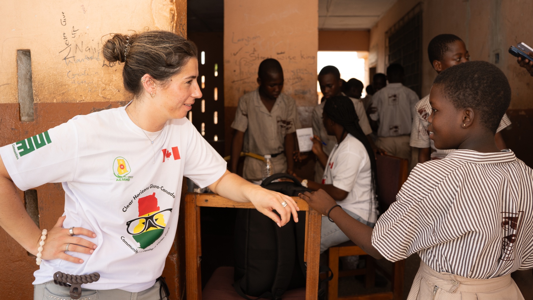 Clear Horizons team member speaking with a student